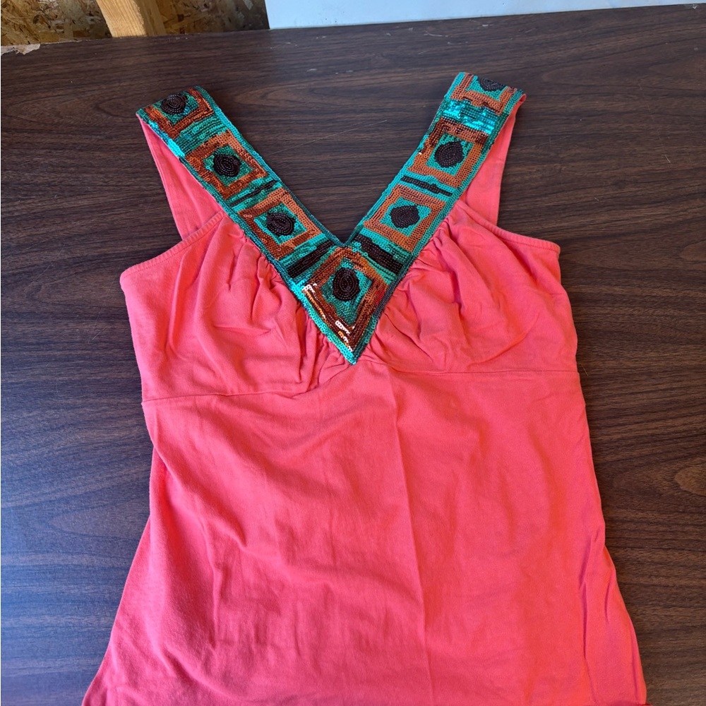 Coral Sleeveless Top with Embellished Neckline
